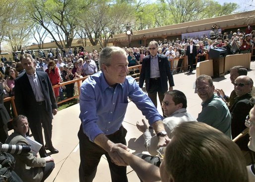 President George W. Bush greets the audience following his remarks about homeownership at Expo New Mexico in Albuquerque, N.M., Friday, March 26, 2004. White House photo by Eric Draper