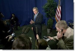 President George W. Bush speaks to the White House Press Pool in Charlotte, N.C., Monday, April 5, 2004.  White House photo by Eric Draper