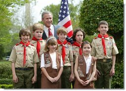 President George W. Bush congratulates the Dodge Elementary Scouts for Wetland Habitat Enhancement of East Amherst, N.Y., on receiving the President’s Environmental Youth Award in the East Garden April 22, 2004.  White House photo by Susan Sterner