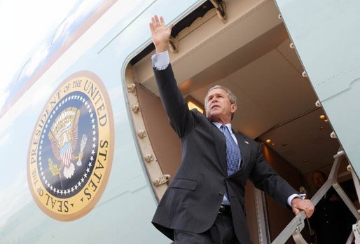 President George W. Bush waves to base personnel of the 934th Airlift Wing of the Air National Guard before departing Minneapolis-St. Paul International Airport in Minneapolis, Minnesota on April 26, 2004. White House photo by Paul Morse.