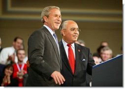 President George W. Bush is introduced by Jesus Carreon before giving remarks to the American Associations of Community Colleges annual convention in Minneapolis, Minn., Monday, April 26, 2004. "Jess told me coming in here that -- I asked him where he was raised. He said, Southern California," commented the President before his remarks. "He said he didn't speak English when he came to America at age five. His dad had big dreams for him. And here he is, years later, introducing the President of the United States in perfect English."  White House photo by Paul Morse
