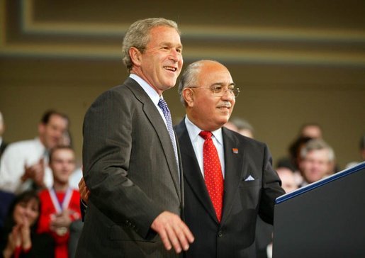 President George W. Bush is introduced by Jesus Carreon before giving remarks to the American Associations of Community Colleges annual convention in Minneapolis, Minn., Monday, April 26, 2004. "Jess told me coming in here that -- I asked him where he was raised. He said, Southern California," commented the President before his remarks. "He said he didn't speak English when he came to America at age five. His dad had big dreams for him. And here he is, years later, introducing the President of the United States in perfect English." White House photo by Paul Morse.