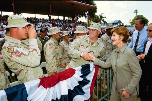Laura Bush thanks the men and women of the United States Military and the National Guard and Reserves for their service to our Nation during her remarks in Winter Haven, Fla., Saturday, May 1, 2004 "You are the face of American compassion abroad. You will have a greater impact than you can ever imagine on people that you will only know for a brief time. But you have delivered the greatest gift they will ever know -- you've sacrificed your own comfort, your own safety, and your own lives so that others might know freedom." White House photo by Tina Hager