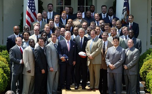 President George W. Bush with the Super Bowl Champion New England Patriots and owner Bob Kraft and coach Bill Belichick during a photo opportunity in the Rose Garden on May 10, 2004. White House photo by Paul Morse