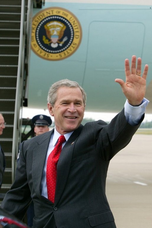 President George W. Bush waves to the crowd upon his arrival to Fort Smith, Ark., Tuesday, May 11, 2004. White House photo by Paul Morse