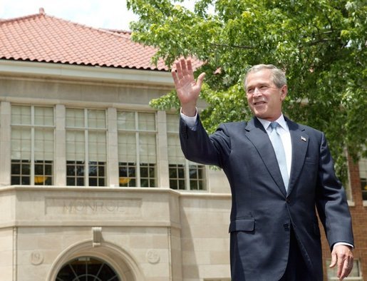 President George W. Bush waves to the audience before delivering remarks during the 50th anniversary of Brown V. Board of Education at the national historic site named in its honor in Topeka, Kan., Monday, May 17, 2004. White House photo by Eric Draper.