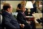 President George W. Bush and Prime Minister Silvio Berlusconi of Italy address the media in the Oval Office Wednesday, May 19, 2004. White House photo by Joyce Naltchayan.