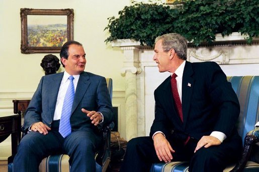 President George W. Bush meets with Prime Minister Konstandinos Karamanlis of Greece in the Oval Office Thursday, May 20, 2004. White House photo by Joyce Naltchayan