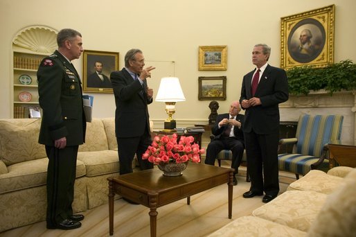 President George W. Bush and Vice President Dick Cheney meet with Secretary of Defense Donald Rumsfeld and General John Abizaid, Combatant Commander of the U.S. Central Command, in the Oval Office Thursday, May 20, 2004. White House photo by Eric Draper