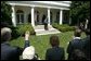 After welcoming the new members of Iraq's interim government, President George W. Bush answers questions from the press in the Rose Garden Tuesday, June 1, 2004. White House photo by Eric Draper.