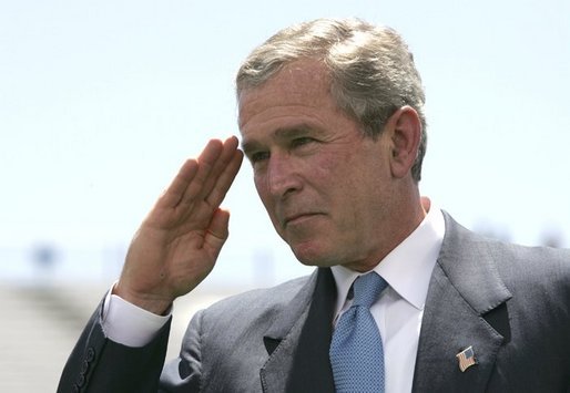 President George W. Bush salutes a graduating cadet at the United States Air Force Academy Graduation Ceremony in Colorado Springs, Colorado, June 2, 2004. White House photo by Eric Draper.