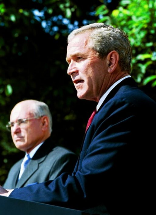 President George W. Bush participates in a joint media availability with Prime Minister of Australia John Howard in the Rose Garden Thursday, June 3, 2004. White House photo by Joyce Naltchayan.