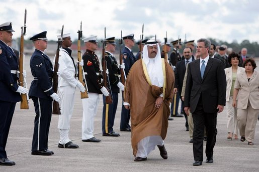 eputy U.S. Chief of Protocol Jeff Eubank hosts President Ghazi al-Yawer of Iraq's interim government during the arrival ceremony at Hunter Army Airfield in Savannah, Ga., Tuesday, June 8, 2004. The newly elected president will participate in this week's G8 Summit. White House photo by Paul Morse