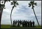Leaders of G8 countries, European officials and guests pose at the beach for a group photo at the G8 Summit in Sea Island, Ga., Wednesday, June 9, 2004. White House photo by Eric Draper.