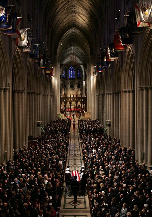 Former President Ronald Reagan's casket is carried out of the National Cathedral after the National Funeral Service in Washington, D.C., Friday, June 11, 2004. White House photo by Tina Hager.