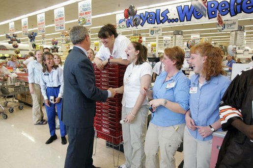 President George W. Bush greets shoppers at the Hy-Vee grocery and pharmacy store in Liberty, Mo., June 14, 2004. White House photo by Paul Morse