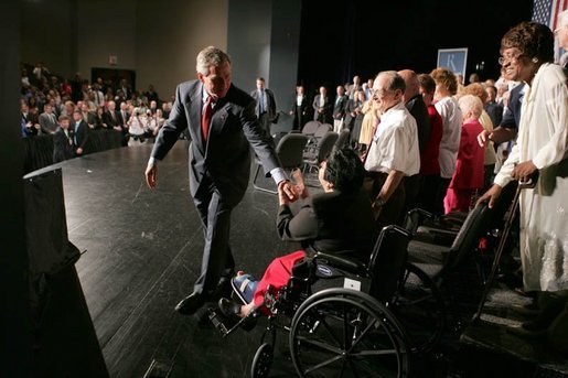 HP8C1942.jpg President George W. Bush greets seniors after a conversation on Medicare-approved prescription drug discount cards in Liberty, Mo., June 14, 2004. White House photo by Paul Morse