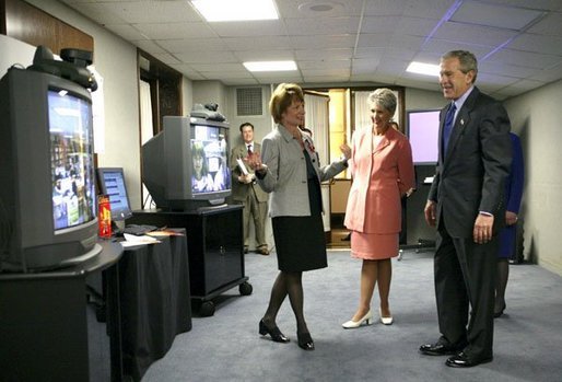 President George W. Bush views a demonstration of broadband and wireless technologies at the U.S. Department of Commerce Thursday, June 24, 2004. White House photo by Tina Hager.