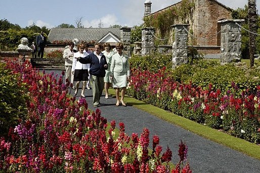 Laura Bush tours the Walled Garden of Dromoland Castle with Head Gardener Dorothea Madden in Shannon, Ireland, Saturday, June 26, 2004. White House photo by Joyce Naltchayan