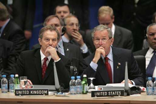 President George W. Bush and Prime Minister Tony Blair of Great Britain participate in the Working Session of the NATO-Ukraine Commission on the final day of meetings in Istanbul, Turkey, Tuesday, June 29, 2004. White House photo by Paul Morse.