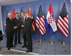 President George W. Bush talks with leaders of the Adriatic Charter Countries following a photo opportunity at the NATO Summit in Istanbul, Turkey, June 29, 2004. From left are President Alfred Moisiu of Albania, President Branko Crvenkovski of Macedonia and President Stjepan Mesic of Croatia.  White House photo by Eric Draper