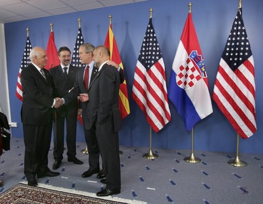 President George W. Bush talks with leaders of the Adriatic Charter Countries following a photo opportunity at the NATO Summit in Istanbul, Turkey, June 29, 2004. From left are President Alfred Moisiu of Albania, President Branko Crvenkovski of Macedonia and President Stjepan Mesic of Croatia. White House photo by Eric Draper.
