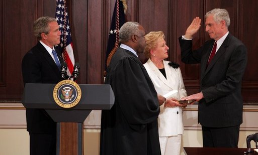 President George W. Bush observes Justice Clarence Thomas swearing-in Senator John Danforth as the new representative of the United States to the United Nations in the Eisenhower Executive Office Building on July 1, 2004. White House photo by Paul Morse