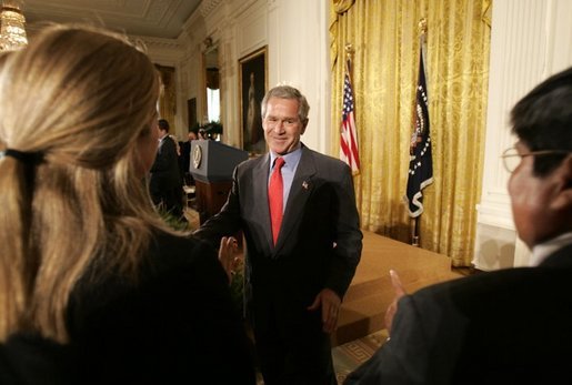 President George W. Bush greets small business owners after delivering remarks on the economy in the East Room, Friday, July 2, 2004. White House photo by Eric Draper