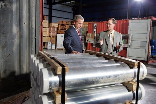 President George W. Bush and Jon Kreykes of the National Security Advanced Technologies group, look over equipment obtained from Libya’s former nuclear weapons program at the Oak Ridge National Laboratory in Oak Ridge Tenn., Monday, July 12, 2004. White House photo by Tina Hager