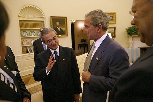 President George W. Bush and Prime Minister Abdullah Badawi of Malaysia meet in the Oval Office Monday, July 19, 2004. Also pictured are National Security Advisor Dr. Condoleezza Rice, left and Secretary of State Colin Powell. White House photo by Tina Hager.