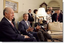 President George W. Bush and President Ricardo Lagos of Chile meet in the Oval Office Monday, July 19, 2004. "One of the things that has worked well is the free trade agreement with Chile, and we talked about that today," said President Bush.  White House photo by Paul Morse