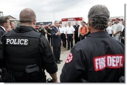 President George W. Bush addresses police and firemen after a demonstration by first responders at Northeastern Illinois Public Training Academy in Glenview, Illinois on Thursday July 22, 2004.  White House photo by Paul Morse