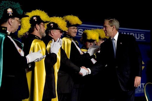 President George W. Bush greets members of the Knights of Columbus after remarks to the 122nd Annual Knights of Columbus Convention in Dallas, Texas, Tuesday, Aug. 3, 2004. White House photo by Eric Draper.