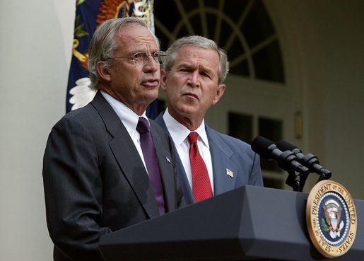 Standing with President George W. Bush, Rep. Porter Goss, R-Fla., addresses the media after the President nominated him to be the director of the CIA in the Rose Garden, Tuesday, Aug. 10, 2004. White House photo by Joyce Naltchayan.