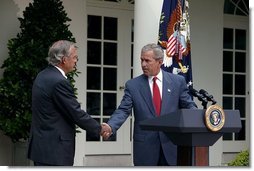 Nominating Rep. Porter Goss, R-Fla., to be the director of the CIA, President George W. Bush extends his hand to him during the Rose Garden announcement Tuesday, Aug. 10, 2004.  White House photo by Joyce Naltchayan