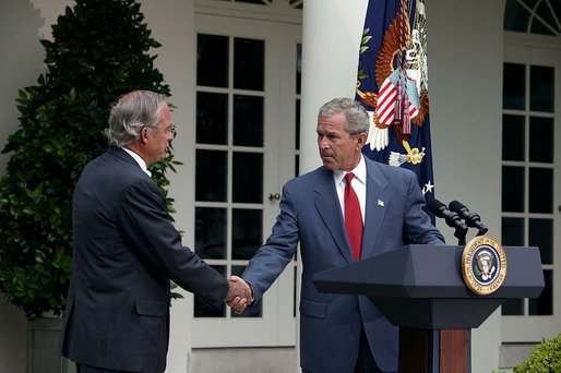 Nominating Rep. Porter Goss, R-Fla., to be the director of the CIA, President George W. Bush extends his hand to him during the Rose Garden announcement Tuesday, Aug. 10, 2004. White House photo by Joyce Naltchayan.
