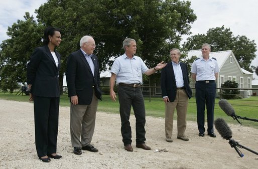 Standing with his national defense team, President George W. Bush talks with the press at Prairie Chapel Ranch in Crawford, Texas, Monday, Aug. 23, 2004. Pictured, from left, are: Dr. Condoleezza Rice, Vice President Dick Cheney, Secretary of Defense Donald Rumsfeld and Chairman of the Joint Chiefs of Staff General Richard Meyers. White House photo by Paul Morse.