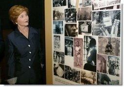 Laura Bush tours the exhibit, "From Slavery to Freedom," at the National Underground Railroad Freedom Center prior to dedication ceremonies in Cincinnati, Ohio, Monday, Aug. 23, 2004.  White House photo by Joyce Naltchayan