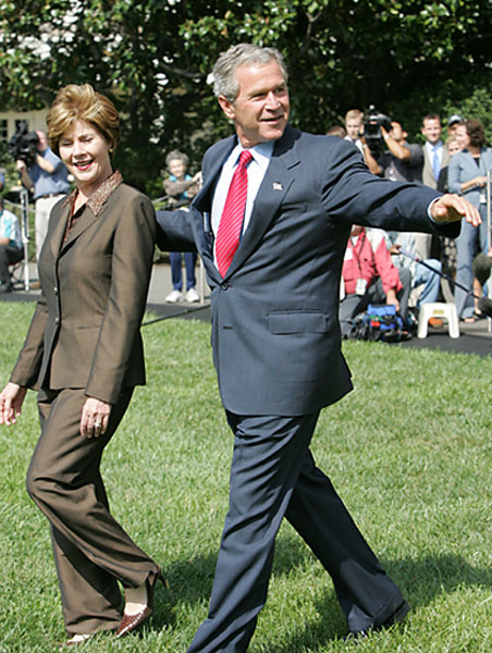 President George W. Bush and Laura Bush wave before departing the South Lawn on Marine One Thursday, Sept. 9, 2004. White House photo by Paul Morse.