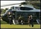 President George W. Bush and Laura Bush depart the South Lawn en route to Andrews Air Force Base, Friday, Sept. 10, 2004. White House photo by Joyce Naltchayan.