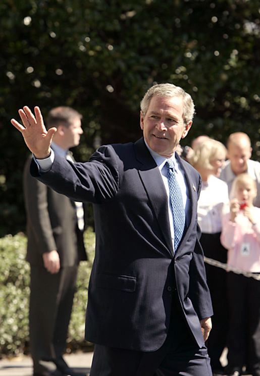 President George W. Bush waves as he departs the South Lawn aboard Marine One Monday, Sept. 20, 2004. White House photo by Paul Morse