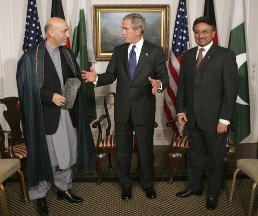 President George W. Bush meets with Presidents Hamid Karzai of Afghanistan, left, and Pervez Musharraf of Pakistan at the United Nations General Assembly Tuesday, Sept. 21, 2004. White House photo by Eric Draper.