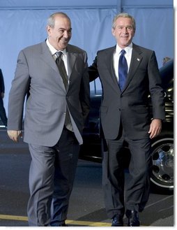 President George W. Bush and Iraqi interim Prime Minister Ayad Allawi arrive at the United Nations Headquarters in New York City Tuesday, Sept. 21, 2004.  White House photo by Paul Morse