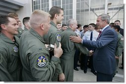 President George W. Bush greets Air Force reservists from Grissom Air Force Base, 434th Air Refueling Wing, at Wright-Patterson Air Force Base Monday, Sept. 27, 2004.  White House photo by Eric Draper
