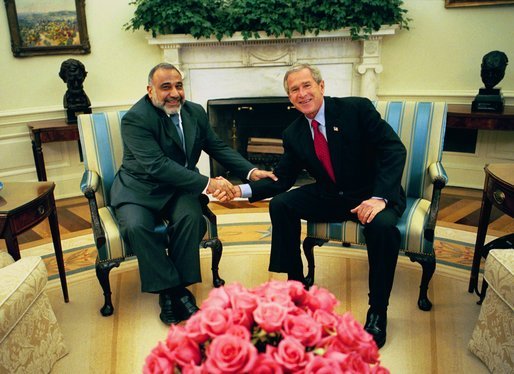 President George W. Bush speaks with Adil Abd al-Mahdi, Finance Minister of the Interim Government of the Republic of Iraq, Thursday, October 07, 2004, in the Oval Office. White House photo by Eric Draper