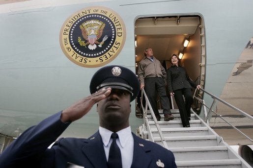 President George W. Bush and Mrs. Bush disembark Air Force One at Outagamie County Regional Airport in Appleton, Wisconsin, Friday, Oct. 15, 2004. White House Photo Eric Draper White House photo by Eric Draper.