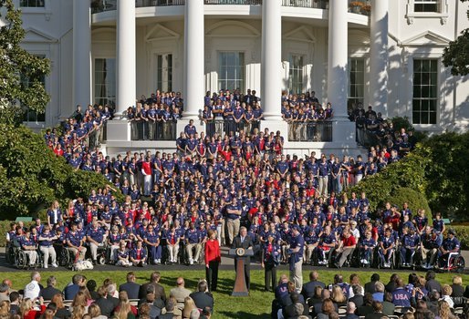 President George W. Bush welcomes the 2004 U.S. Olympic and Paralympic Teams on the South Lawn Monday, Oct. 18, 2004. "With millions watching, you showed the best values of America," said the President. "You were humble in victory, gracious in defeat. You showed compassion for your competitors. You showed the great tolerance and diversity of our people." White House photo by Paul Morse