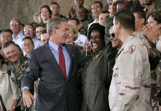 After delivering his remarks, President Bush greets military personnel at MacDill Air Force Base in Tampa, Fla., June 16, 2004. White House photo by Eric Draper.