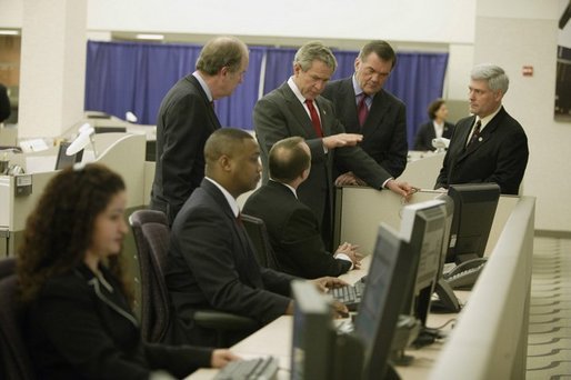 President George W. Bush tours the National Targeting Center (NTC) in Reston, Va., Feb. 6, 2004. The NTC is part of Homeland Security's Bureau of Customs and Border Protection, the center provides analytical research support for counterterrorism efforts. White House photo by Paul Morse