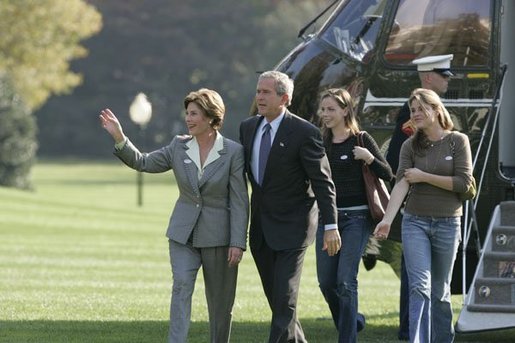 President George W. Bush and Laura Bush return to the White House with their daughters Barbara, left, and Jenna, right, Tuesday, Nov. 2, 2004. White House photo by Paul Morse